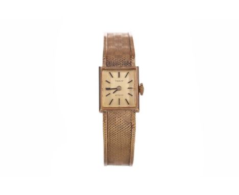 LADY'S TISSOT NINE CARAT GOLD MANUAL WIND WRIST WATCH,the rectangular champagne dial with applied baton hour markers, 14mm ca