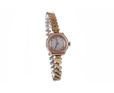 LADY'S ROLEX PRIMA NINE CARAT GOLD MANUAL WIND WRIST WATCH,the round silvered sunburst dial with Arabic hour markers, outer s