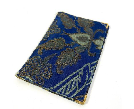 A vintage Cartier silk and 18 carat gold banknote purse, circa 1940, a folding rectangle of silk damask with gold corner moun