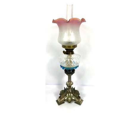A fine Victorian silver plated and decorative glass oil lamp, 19th century, with cranberry flashed shade, the base with winge