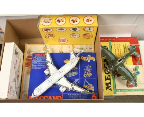Meccano group of mixed period outfits consisting of 1960's outfit No.4 with parts in Red and Green includes instructions date