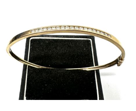 9ct Gold Channel Set Diamond Bangle (5.4g) o.40ct diamonds