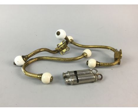 WWI LIGHTER, along with other items including wardrobe fittings, whistles and a vintage electrical plug