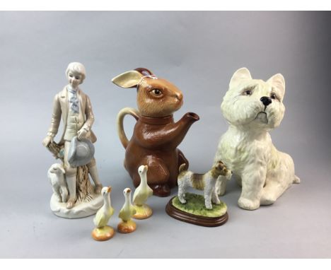 LOT OF CERAMIC ANIMAL AND OTHER FIGURES, including a terrier, geese, a rabbit tea pot, a ceramic shepherd and shepherdess, th