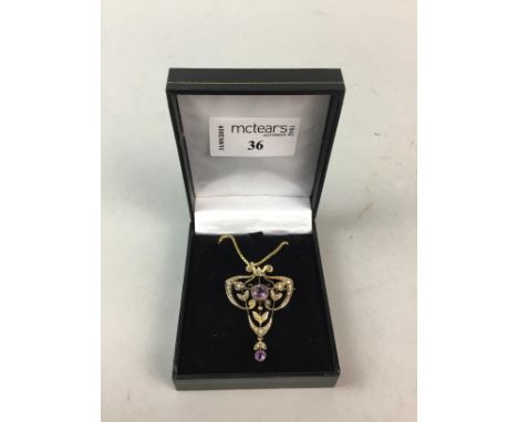 EDWARDIAN AMETHYST AND SEED PEARL HOLBEIN, set with a central round faceted amethyst of approximately 6mm diameter, with seed