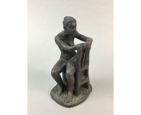 BRONZED CERAMIC SCULPTURE, modelled as a nude lady on a chair, 20cm high