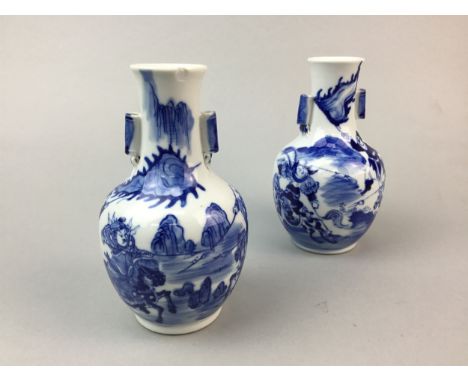 PAIR OF 20TH CENTURY CHINESE BLUE AND WHITE VASES, each 15cm high, along with a dragon table lighter, Chinese brass scholar, 