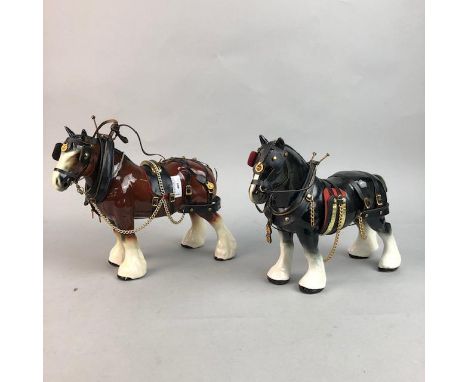 PAIR OF CERAMIC HORSES, the horses with bridles and tack, the taller 26cm high (2)
