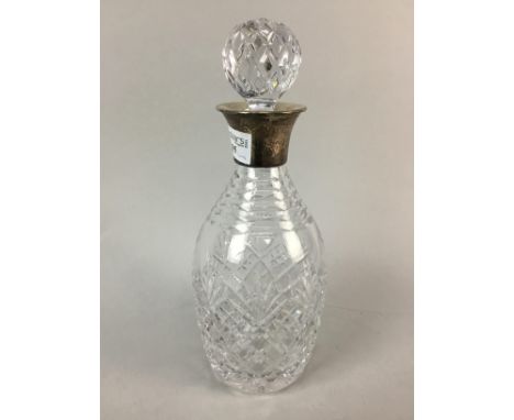 GLASS DECANTER, with silver mounted neck, 27cm high, along with a plated three piece tea service and other plated ware