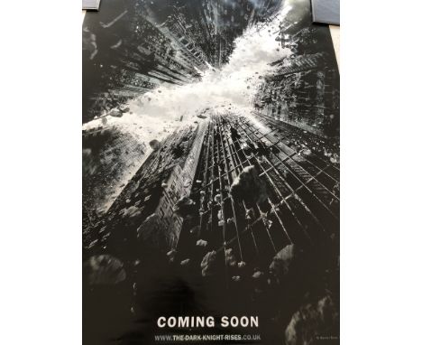 Two posters for the film "The Dark Knight Rise", one landscape, one portrait, 69 x 102cm.