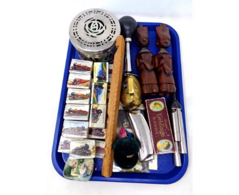 A tray containing miscellany to include a boxed M Hohner harmonica, wooden recorder, carved wooden figures, cameo broach, a c