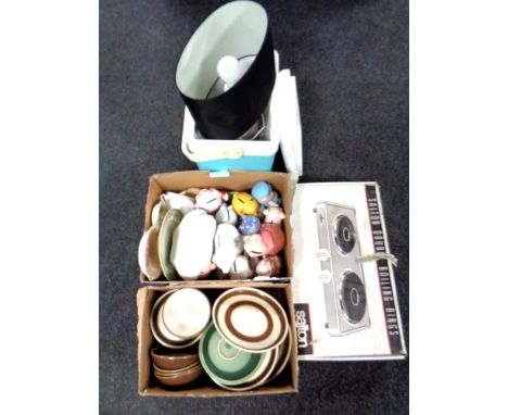 Two boxes containing miscellaneous ceramics include Denby dinner ware, money boxes together with a two ring hob, a cool box a