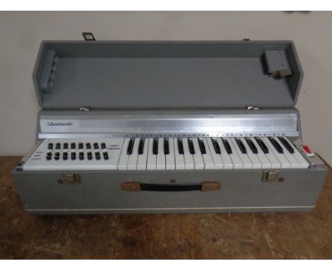 A 20th century J Busilacchio accordion piano, cased 