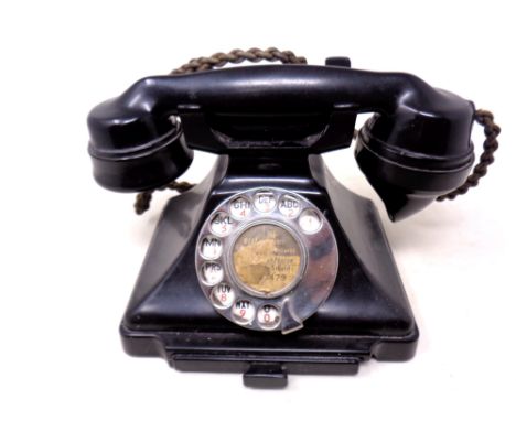 A vintage Bakelite cased telephone 