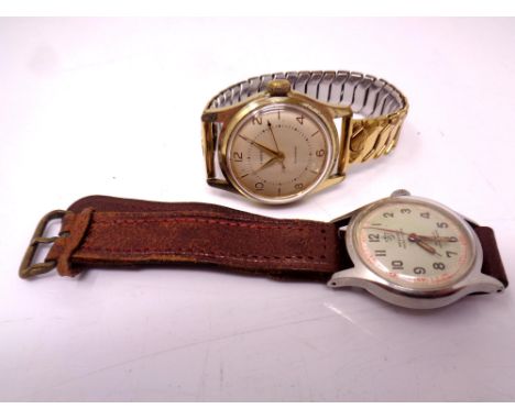 A gent's vintage gold plated Timex centre seconds wristwatch, together with a stainless steel wristwatch signed Swiss Made In