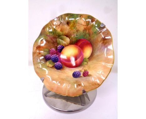 A Royal Worcester gilt-rimmed shallow circular bowl, with hand-painted Peach and Blackberry decoration, signed by George Mose