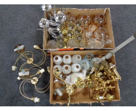 Two boxes containing a large quantity of assorted strip lights, light fittings, brass wall lights with assorted glass shades 