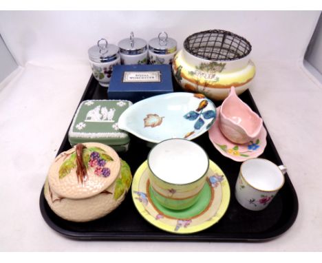 A tray containing assorted ceramics to include Royal Doulton rose bowl teacup and saucer, Royal Worcester egg coddlers, Carlt