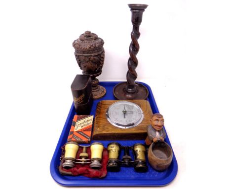 A tray containing miscellanea to include Edwardian oak barely twist candlestick, a heavily carved oak lidded goblet, leather 