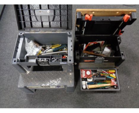 A two step tool carrier together with a Black and Decker work mate work box containing assorted hand tools