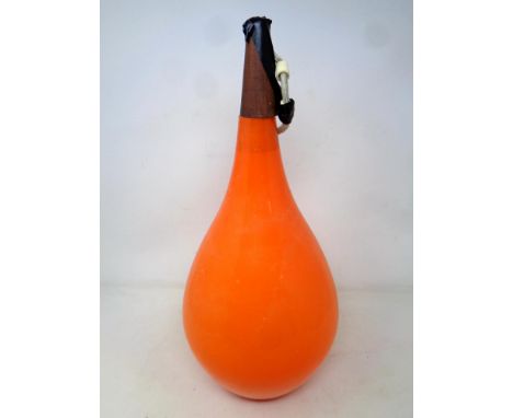 A mid 20th century glass light shade. Height 35 cm