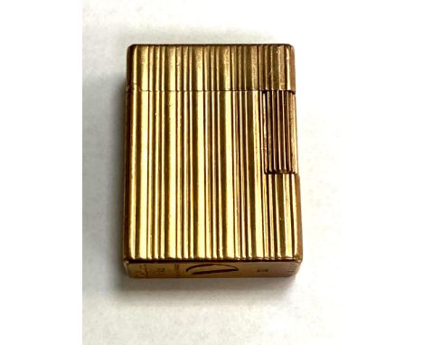 A vintage Dupont cigarette lighter
