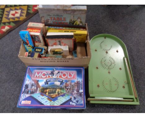 A box containing vintage and later games to include Pelham stable tennis, Mickey Mouse Ludo, Dominoes, Card games, Monopoly t