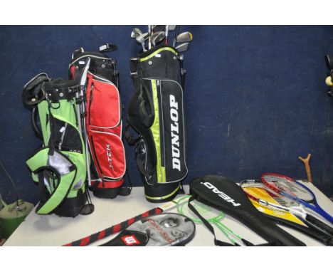 THREE JUNIOR GOLF BAGS containing various clubs such as Nike, Wilson, Dunlop, J-Tek and Masters and a selection of tennis and