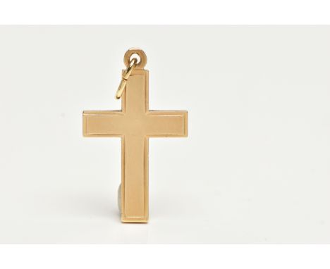 A YELLOW METAL CROSS PENDANT, polished cross, stamped 585, fitted with a jump ring, length including bail 31mm, approximate g