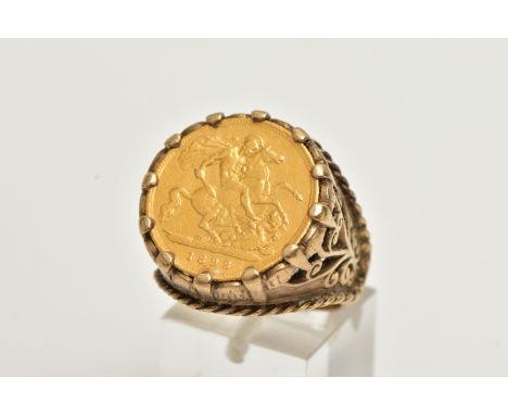 A HALF SOVEREIGN RING, half sovereign dated 1898, claw set in a yellow gold mount, openwork scrolling detail to the shoulders