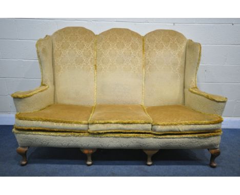 A GEORGIAN STYLE HIGH WING BACK SOFA, gold fabric, flat outswept arms, on four cabriole legs, length 187cm x depth 86cm x hei