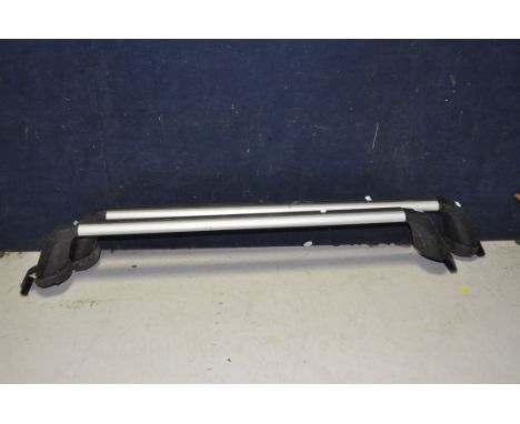 A TOYOTA BARRACUDA BIKE CARRIER with keys and instruction manual, along with a pair of roof bars/roof rack (2)