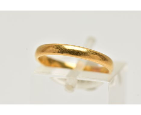 A POLISHED 22CT GOLD BAND RING, thin band approximately 2.4mm, hallmarked 22ct Birmingham, ring size J 1/2, approximate gross