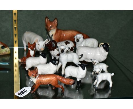 A GROUP OF BESWICK FARM ANIMALS AND FOXES, comprising a Fox - Standing model no 1016A (one leg and tail reglued), a Fox - Sta