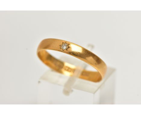 A DIAMOND SET, 22CT GOLD BAND RING, designed with a star set single cut diamond, to a polished band, approximate band width 3