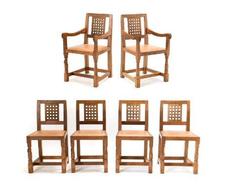 Workshop of Robert Mouseman Thompson (Kilburn): A Set of Six (4+2) English Oak Lattice Back Dining Chairs, tan cow hide seats