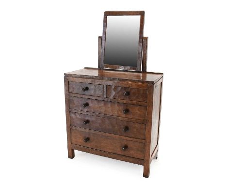 Robert Mouseman Thompson (1876-1955): An English Oak Panelled Dressing Chest, circa 1930s/40s, with a rectangular mirror abov