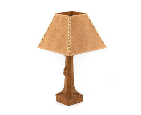 Workshop of Robert Mouseman Thompson (Kilburn): An English Oak Table Lamp, octagonal column on a square base, with carved mou