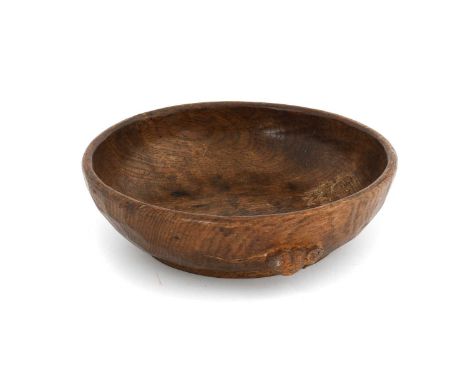 Robert Mouseman Thompson (1876-1955): An English Oak Fruit Bowl, tooled interior and exterior, with carved mouse trademark to