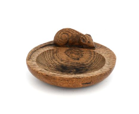 Robert Mouseman Thompson (1876-1955): An English Oak Circular Pin Tray, with carved mouse trademark, 11cm diameterOld damage 