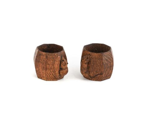 Workshop of Robert Mouseman Thompson (Kilburn): Two English Oak Napkin Rings, of standard rectangular form, each with carved 