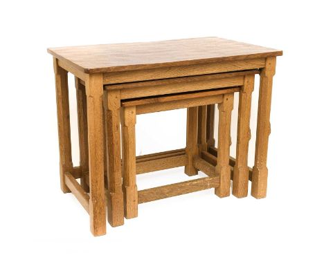 Workshop of Robert Mouseman Thompson (Kilburn): An English Oak Nest of Three Tables, adzed rectangular tops, on four octagona