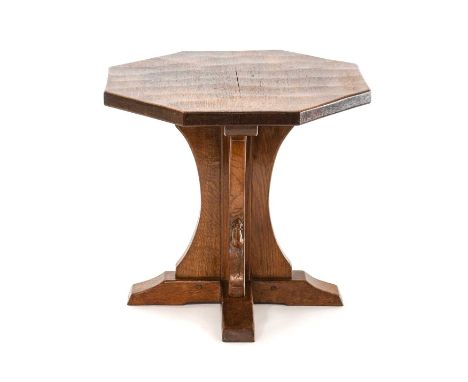 Robert Mouseman Thompson (1876-1955): An English Oak Octagonal Coffee Table, adzed top, on a cruciform base, with carved mous