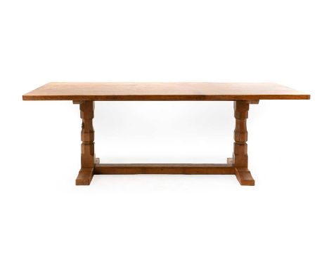 Workshop of Robert Mouseman Thompson (Kilburn): An English Oak 6ft Refectory Dining Table, the adzed rectangular top on two o