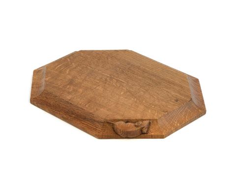 Workshop of Robert Mouseman Thompson (Kilburn): An English Oak Bread Board, of octagonal form, with carved mouse trademark, 3