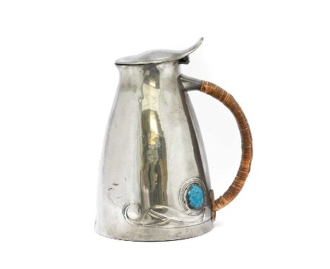 Archibald Knox (1864-1933) for Liberty &amp; Co.: A Tudric Pewter and Enamel Jug, with a hinged cover and thumbpiece, rattan 