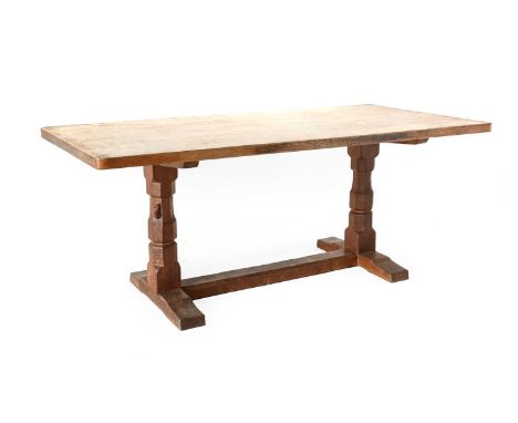 Workshop of Robert Mouseman Thompson (Kilburn): An English Oak 6ft Refectory Dining Table, the adzed top, on two octagonal le