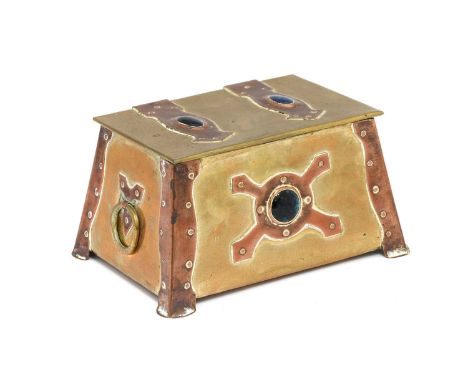 An Arts &amp; Crafts Copper and Brass Jewellery Casket, of tapering rectangular form, the cover with two strap work hinges ea