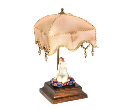 A Royal Doulton Negligee Figural Table Lamp, the figure bolted to a stained plinth base with brass arm and silk shade, green 