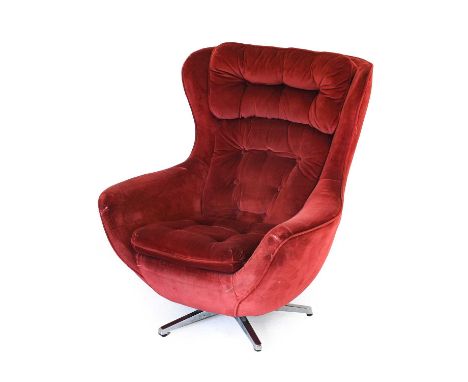 A Mid Century Swivel Lounge Armchair, circa 1960's/70's, red velvet upholstery, on an aluminium five prong base, unmarked, 10